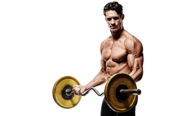 Retrato de primer plano de un entrenamiento de hombre musculoso con barra en el gimnasio
. - Foto, Imagen
