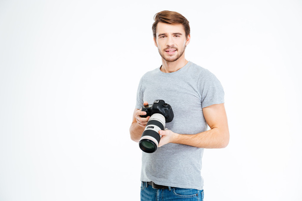 Photographer holding photo camer - Fotó, kép