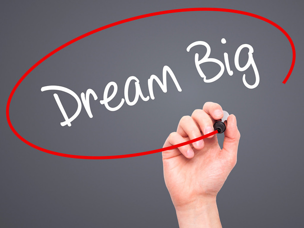 Man Hand writing Dream Big  with black marker on visual screen - Photo, Image