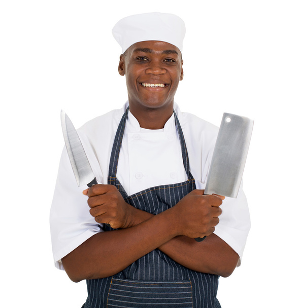 butcher holding knives - Фото, изображение