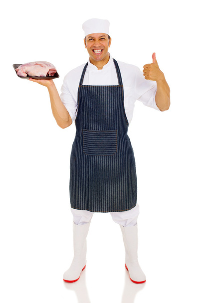 butcher showing fresh meat - Foto, afbeelding