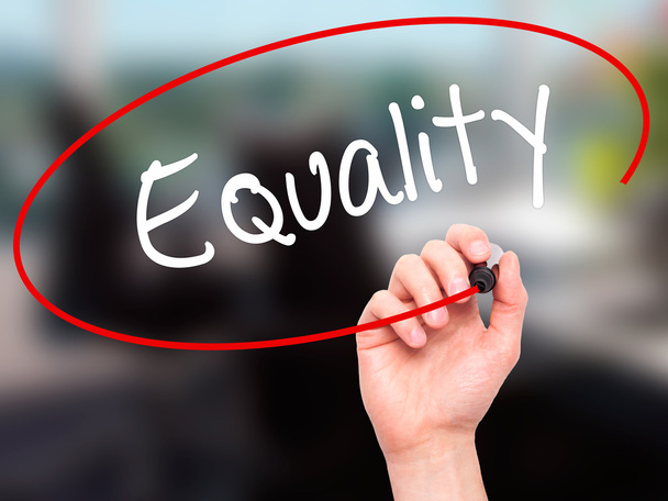 Man Hand writing Equality  with black marker on visual screen - Photo, Image