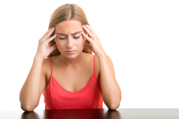 vrouw die lijden aan een hoofdpijn - Foto, afbeelding