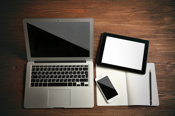 Modern laptop on table - Фото, изображение