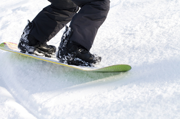 piernas snowboarder, deportes activos
 - Foto, Imagen