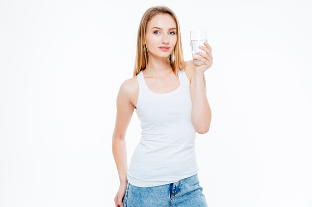 Charming woman holding glass with water - Фото, зображення