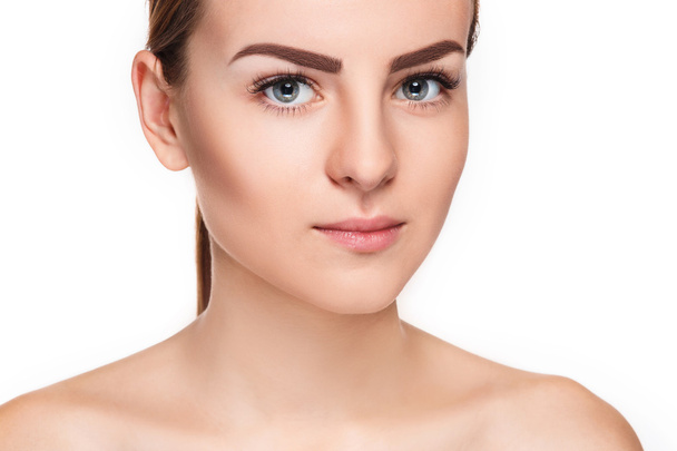 The beautiful face of young woman with cleanf fresh skin - Valokuva, kuva
