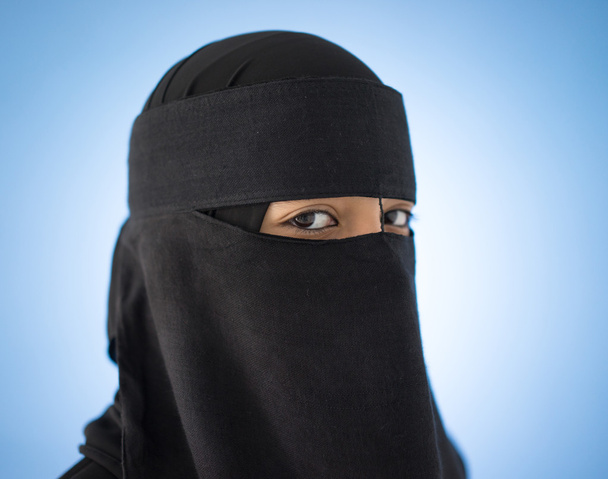 Arabic Muslim girl with veil on face - Fotó, kép