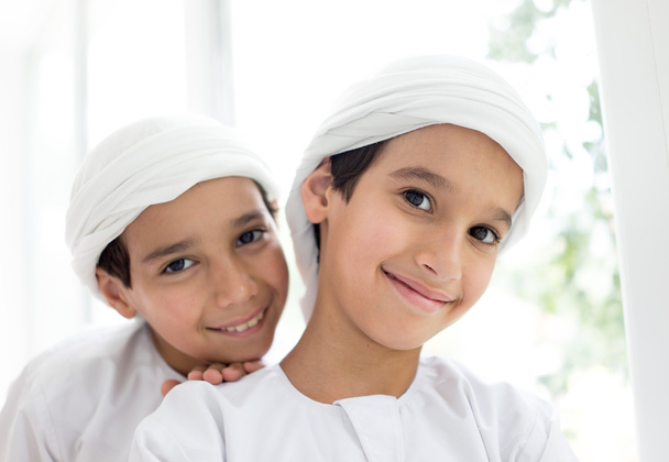 Two Arabic brothers together at home - Φωτογραφία, εικόνα
