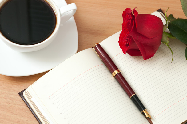 Notebook and rose - Photo, Image