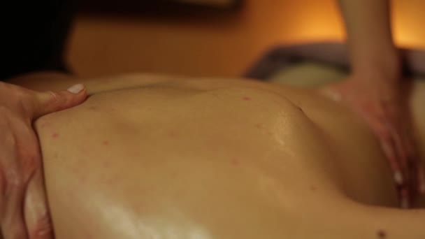 Massage on the back of a man - Materiał filmowy, wideo