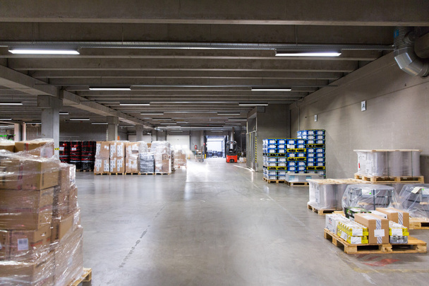 forklift loader and boxes at warehouse - Photo, Image
