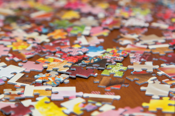 colorful puzzle on the desk - Photo, image