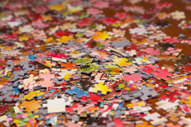 colorful puzzle on the desk - Foto, Imagen