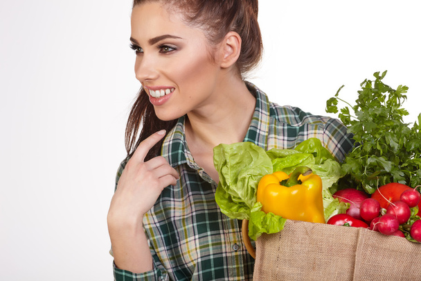 woman with groceries in bag - Foto, Imagen