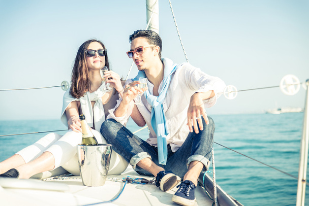 Couple drink champagne on a boat - Photo, Image
