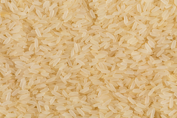 Uncooked rice background - Фото, изображение