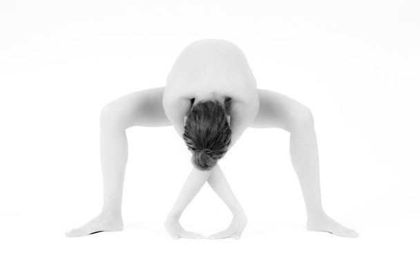 Woman performing Yoga positions - Φωτογραφία, εικόνα