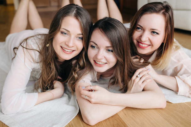 Three attractive girlfriends spends  time together at home - Valokuva, kuva