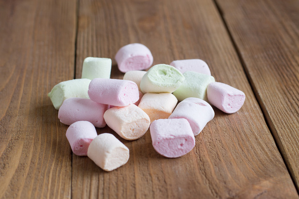 delicate, delicious marshmallows  on a wooden background - Photo, Image