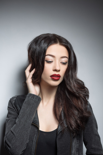 Fashion model woman with dark red lips in studio - Foto, Imagem