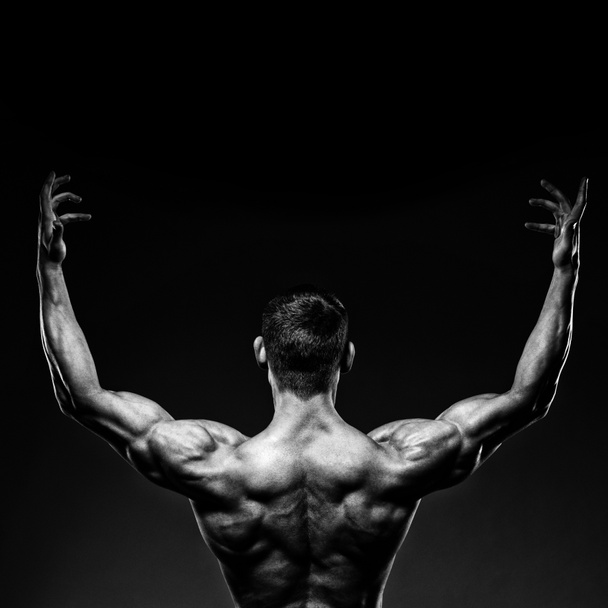 bodybuilder posant et tournant le dos
 - Photo, image