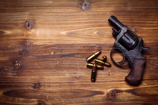 Vintage pistols on wooden background - Photo, Image