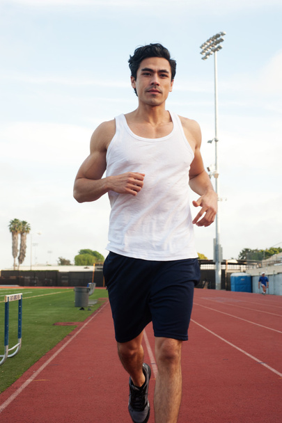 Handsome, young latino runner - Foto, afbeelding