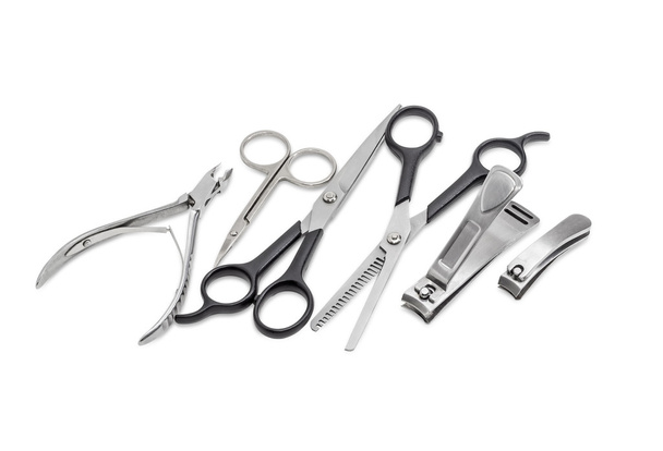 Кілька різних ножиць для нігтів, ножиці для нігтів та дві перукарні
 - Фото, зображення