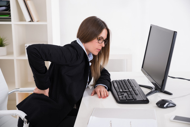 Businesswoman With Back pain - Foto, Imagen