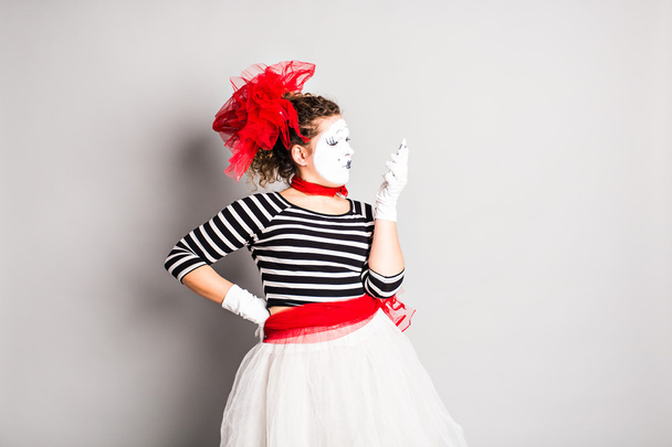 mime with smartphone. Concept of  April Fools Day. - Photo, Image