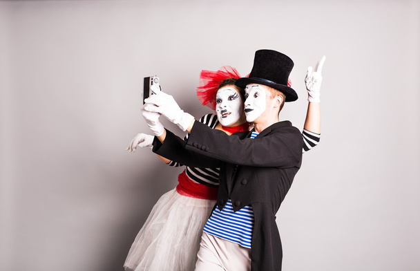 Funny couple of mimes taking a selfie photo,  April Fools Day - Photo, Image