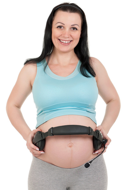 Pregnant belly with headphones - Φωτογραφία, εικόνα