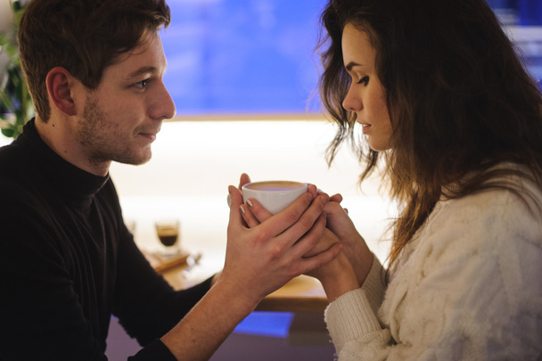 Woman and men holding hot cup  - Photo, image