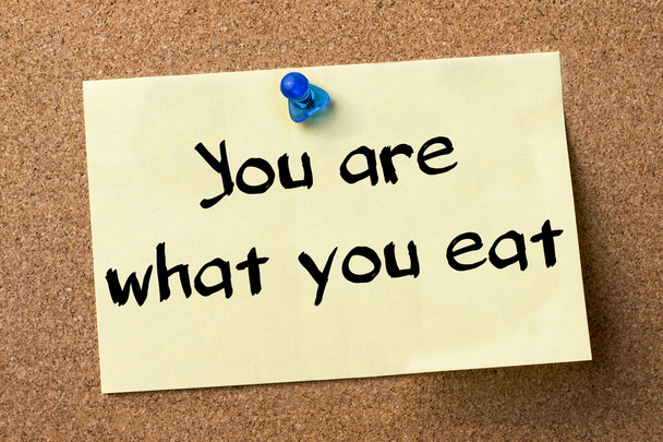 You are what you eat - adhesive label pinned on bulletin board - Photo, image
