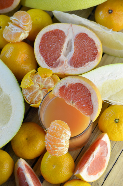 different citrus fruit and juice - Photo, Image