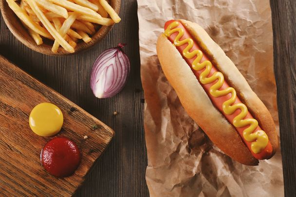 Hot dog with fried potatoes - Foto, imagen