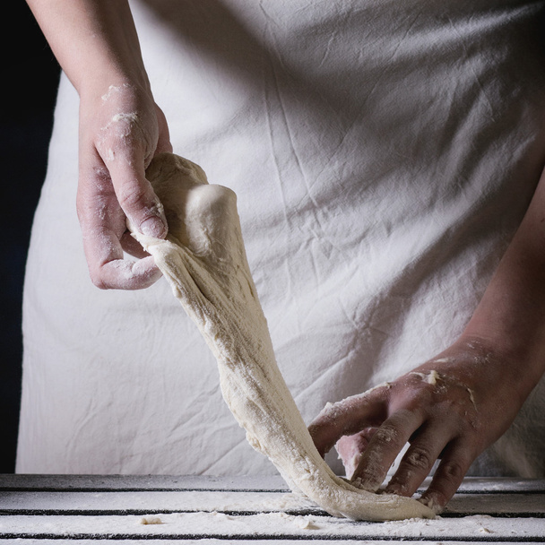 dough for pizza - Foto, afbeelding
