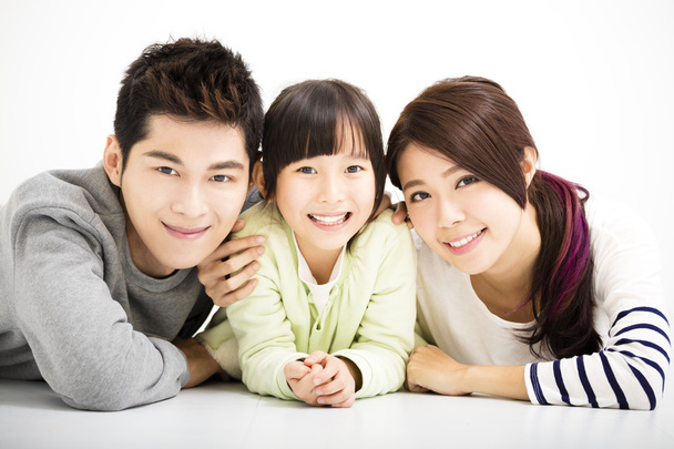 Ευτυχισμένη οικογένεια πορτρέτο ελκυστικό νεαρό - Φωτογραφία, εικόνα