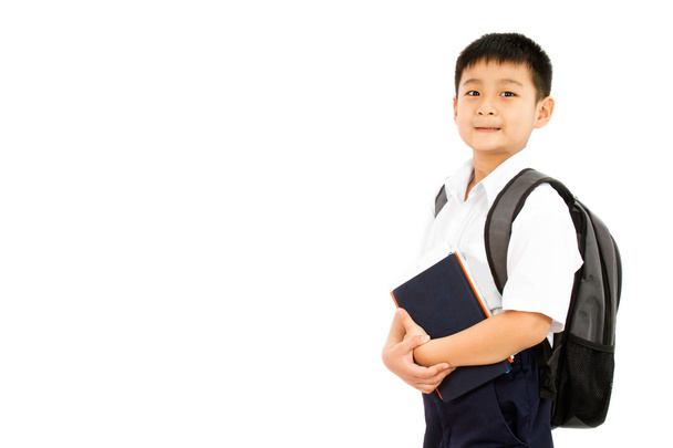 Asian Little School Boy Holding Books with Backpack - Фото, изображение