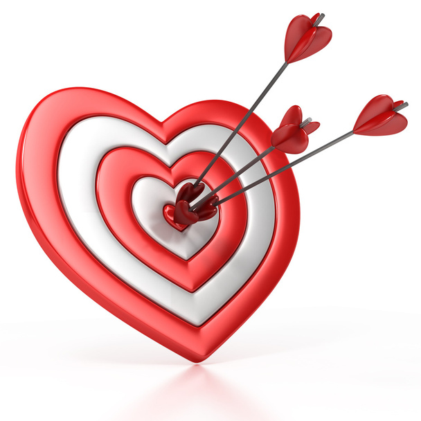 Heart shaped target with the arrow in the center isolated over white - Photo, image