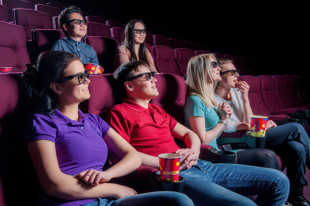People in the cinema wearing 3d glasses - Foto, immagini