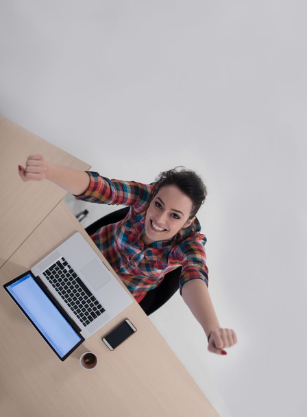 top view of young business woman working on laptop - Foto, Bild