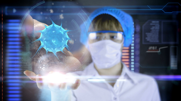 Female doctor with futuristic hud screen tablet.  Bacteria, virus, microbe. Medical concept of the future - Metraje, vídeo