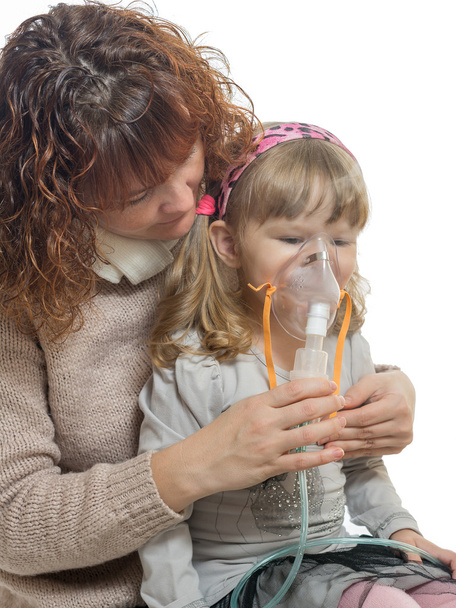 girl with mum makes inhalation - Foto, immagini