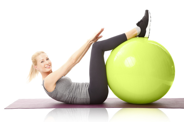 woman doing stomach crunches - Photo, image