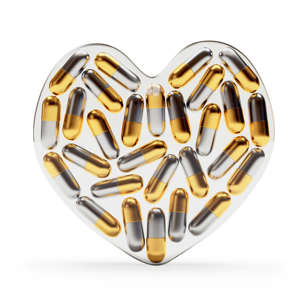 Glass heart full of pills on white - Фото, зображення