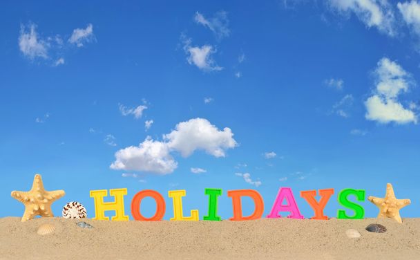 Holidays letters on a beach sand - Фото, изображение
