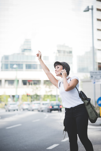 Woman asking for a taxi - Fotografie, Obrázek