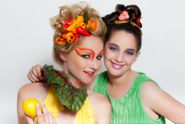 Thinking Green Beautiful Women decorated with Fresh Fruit and Ve - Foto, Bild